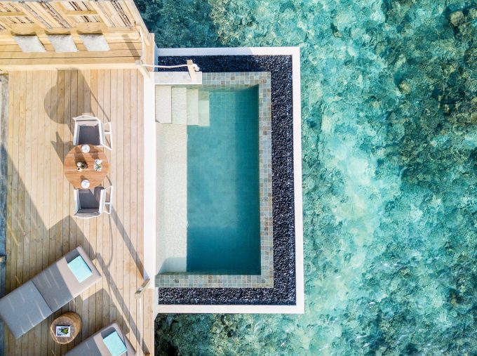 intercontinental-maldives-hero-shot-outdoor-pool-deck-lagoon-pool-villa-aerial-view